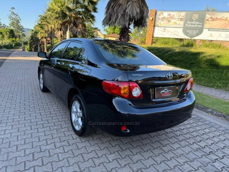 TOYOTA - COROLLA - 2010/2011 - Preta - R$ 50.900,00