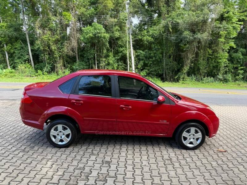 FORD - FIESTA - 2009/2009 - Vermelha - R$ 27.900,00
