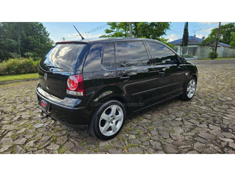 VOLKSWAGEN - POLO - 2006/2007 - Preta - R$ 34.900,00