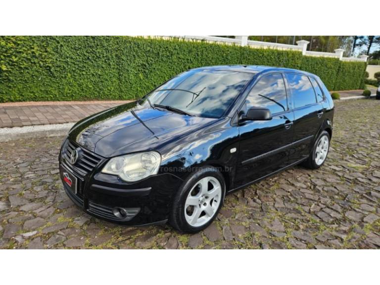 VOLKSWAGEN - POLO - 2006/2007 - Preta - R$ 34.900,00