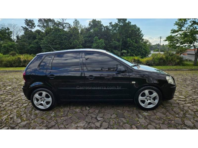 VOLKSWAGEN - POLO - 2006/2007 - Preta - R$ 34.900,00