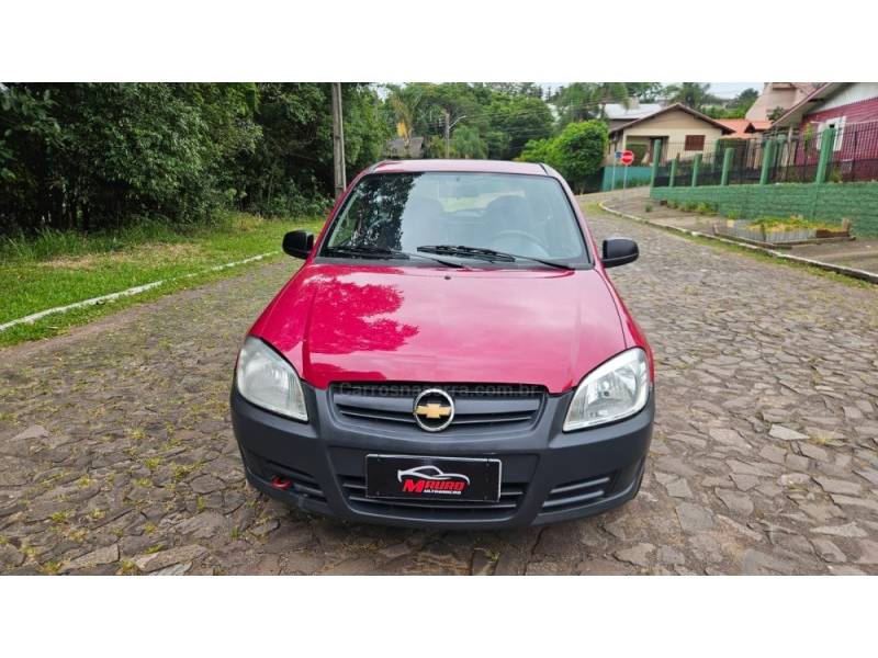 CHEVROLET - CELTA - 2010/2011 - Vermelha - R$ 20.900,00