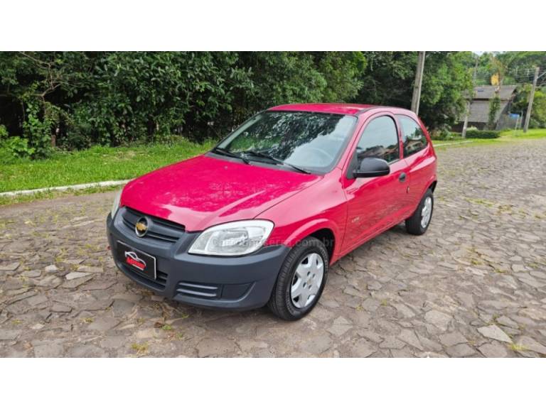 CHEVROLET - CELTA - 2010/2011 - Vermelha - R$ 20.900,00