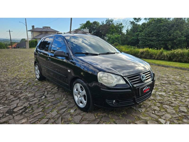 VOLKSWAGEN - POLO - 2006/2007 - Preta - R$ 34.900,00